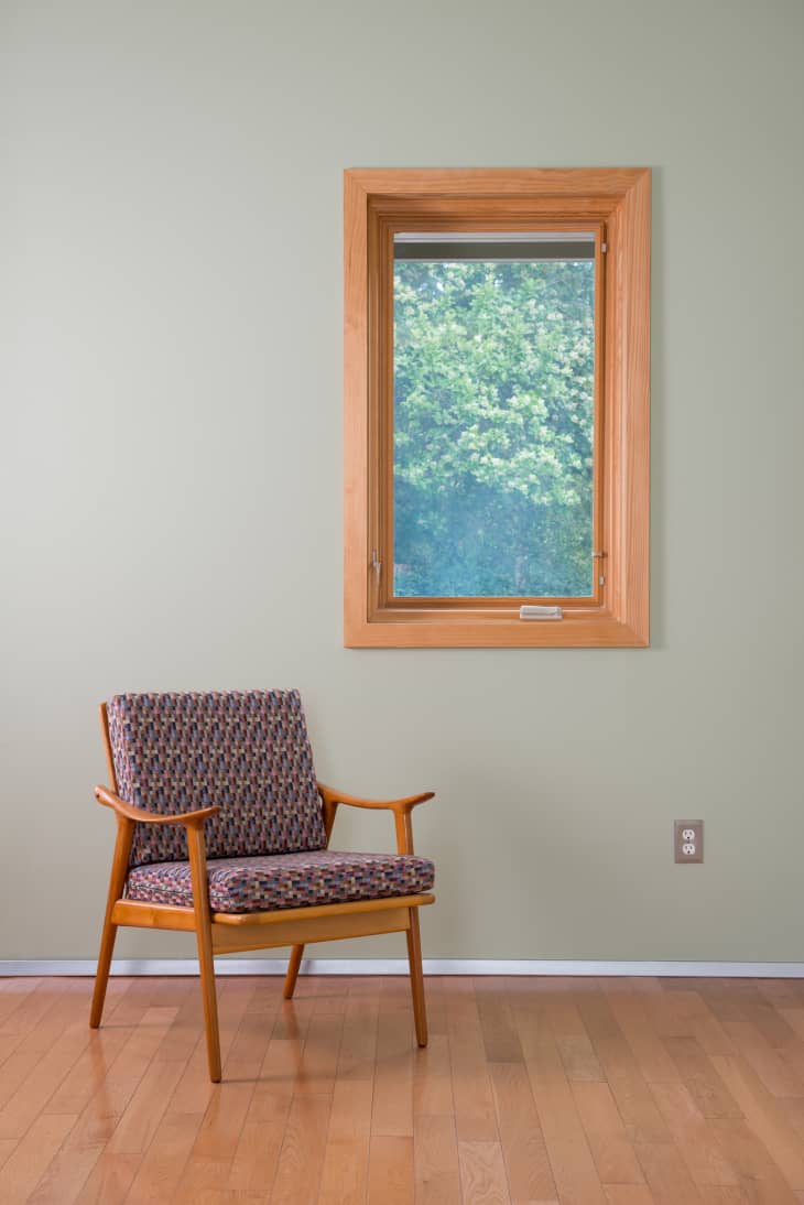 Mid century modern chair in a room