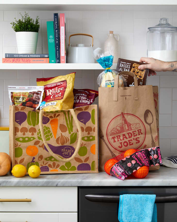 trader joes bag with goods on kitchen counter