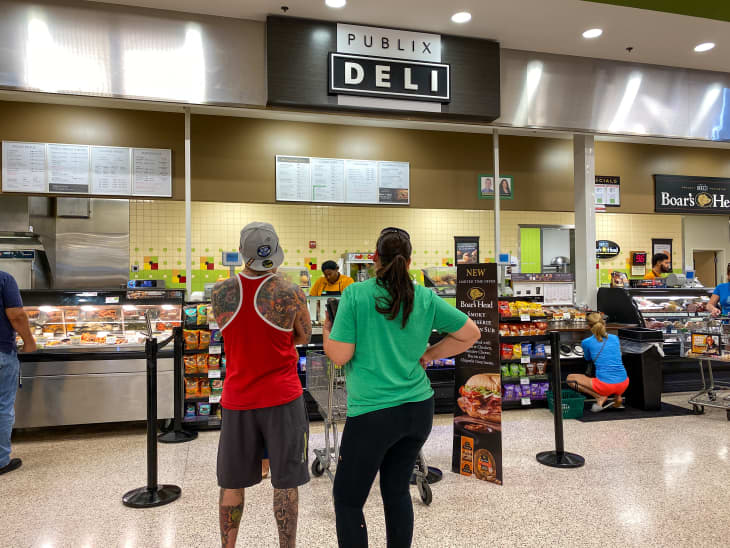 Orlando,FL/USA -1/15/20:  The deli counter of a Publix grocery store with colorful sliced meat and cheese and freshly prepared sandwiches ready to be purchased by consumers.
