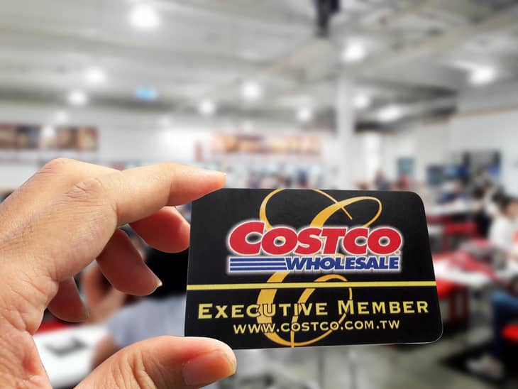Costco wholesale warehouse shopping, membership club, membership card (black diamond card), blurred background