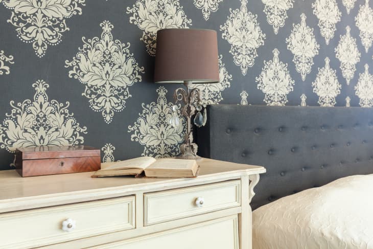 Grey patterned wallpaper in bedroom