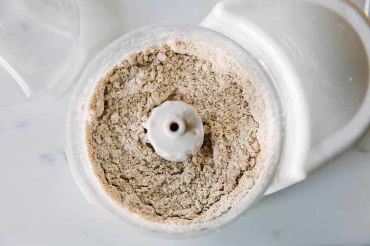 Process 1 cup of the oats in a coffee grinder, blender, or food processor fitted with the blade attachment until it resembles flour, about 3 minutes. Transfer to a large bowl.