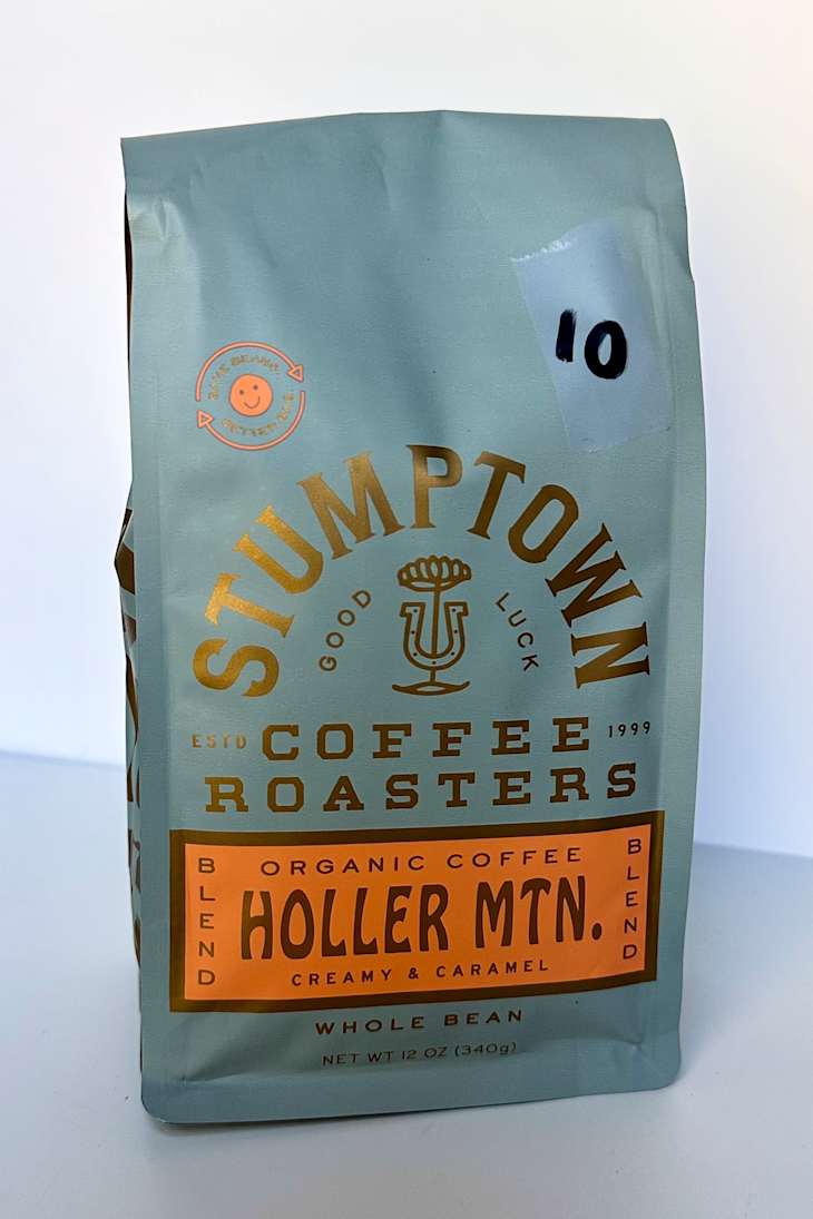 Coffee bag from Stumptown Roasters featuring "Holler Mtn." blend, labeled as organic, creamy, and caramel.
