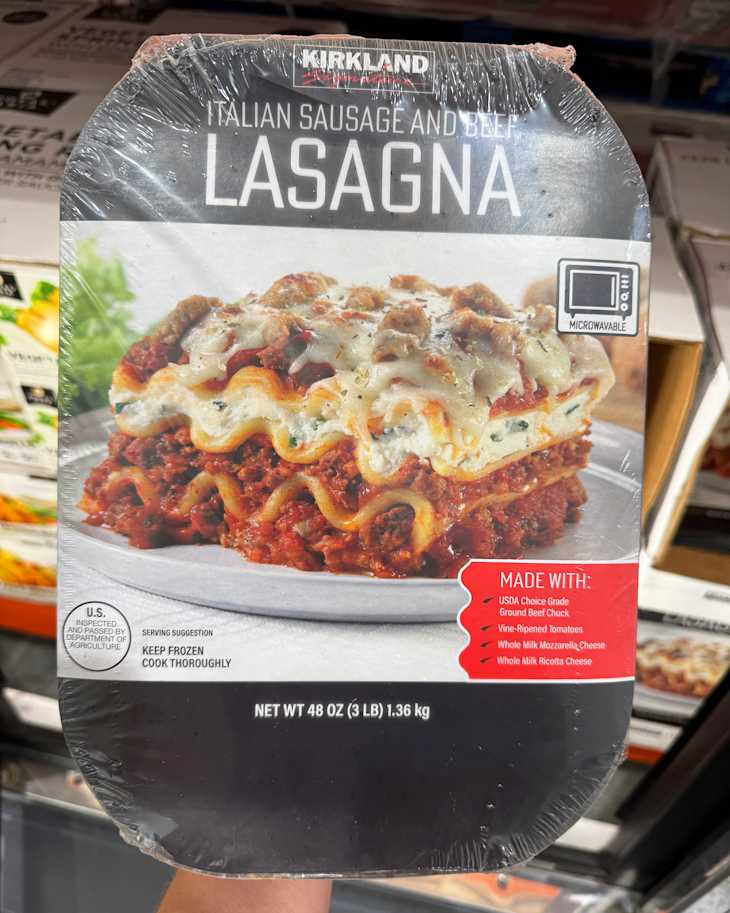 Frozen lasagna package featuring layers of pasta, meat sauce, and melted cheese, labeled as Italian Sausage and Beef.