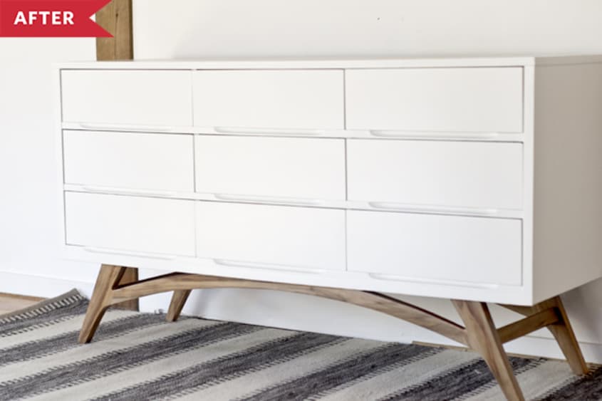 After: White painted dresser with medium-tone wood legs