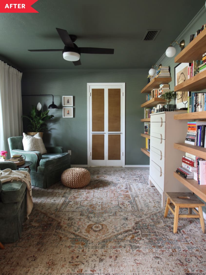 After: Green living room with patterned area rug and open bookshelves