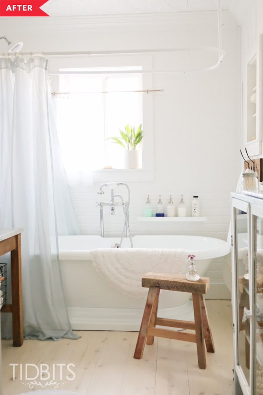 After: Large, open bathroom with standalone tub