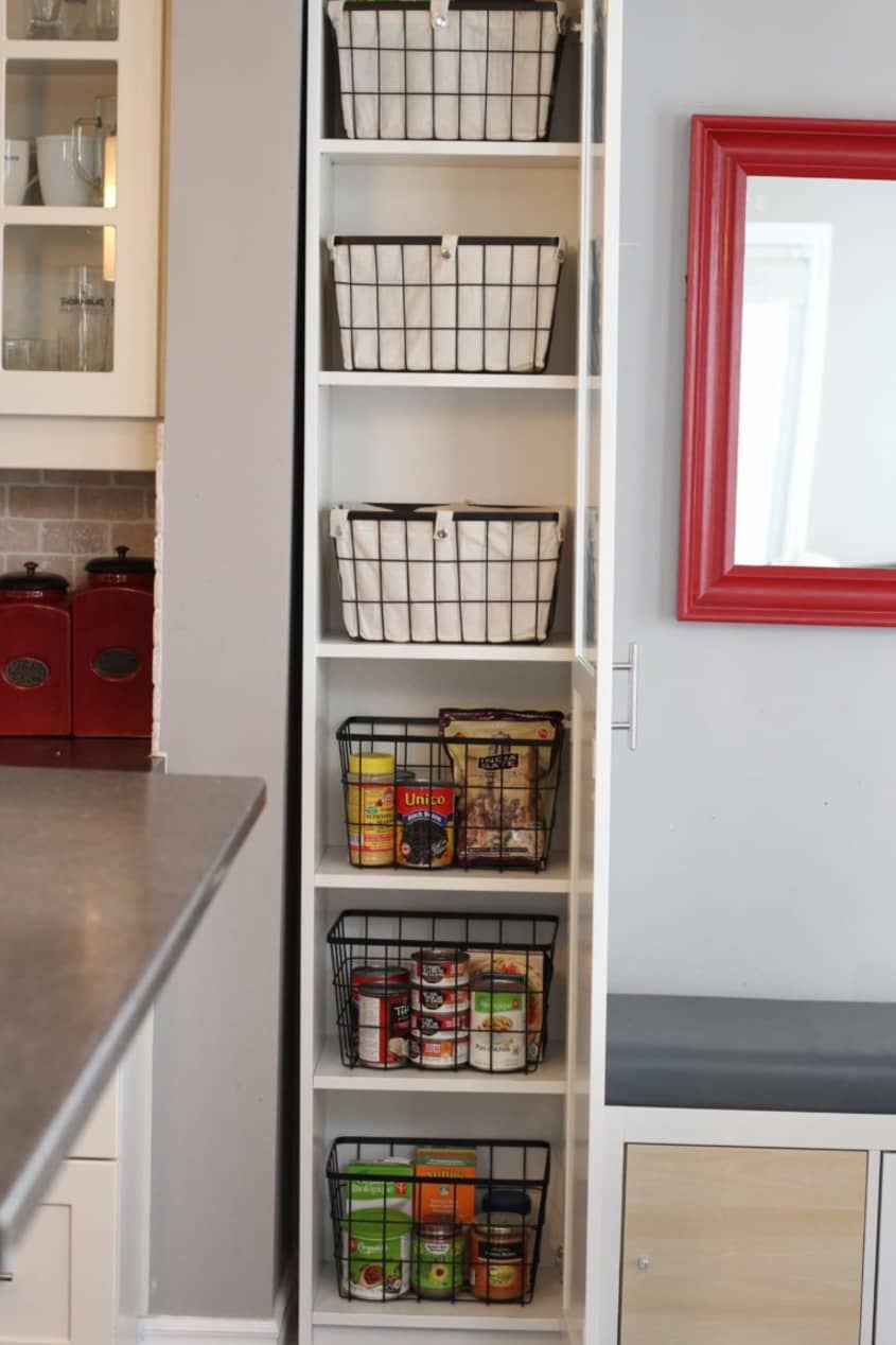 IKEA Billy bookcase with baskets and food storage