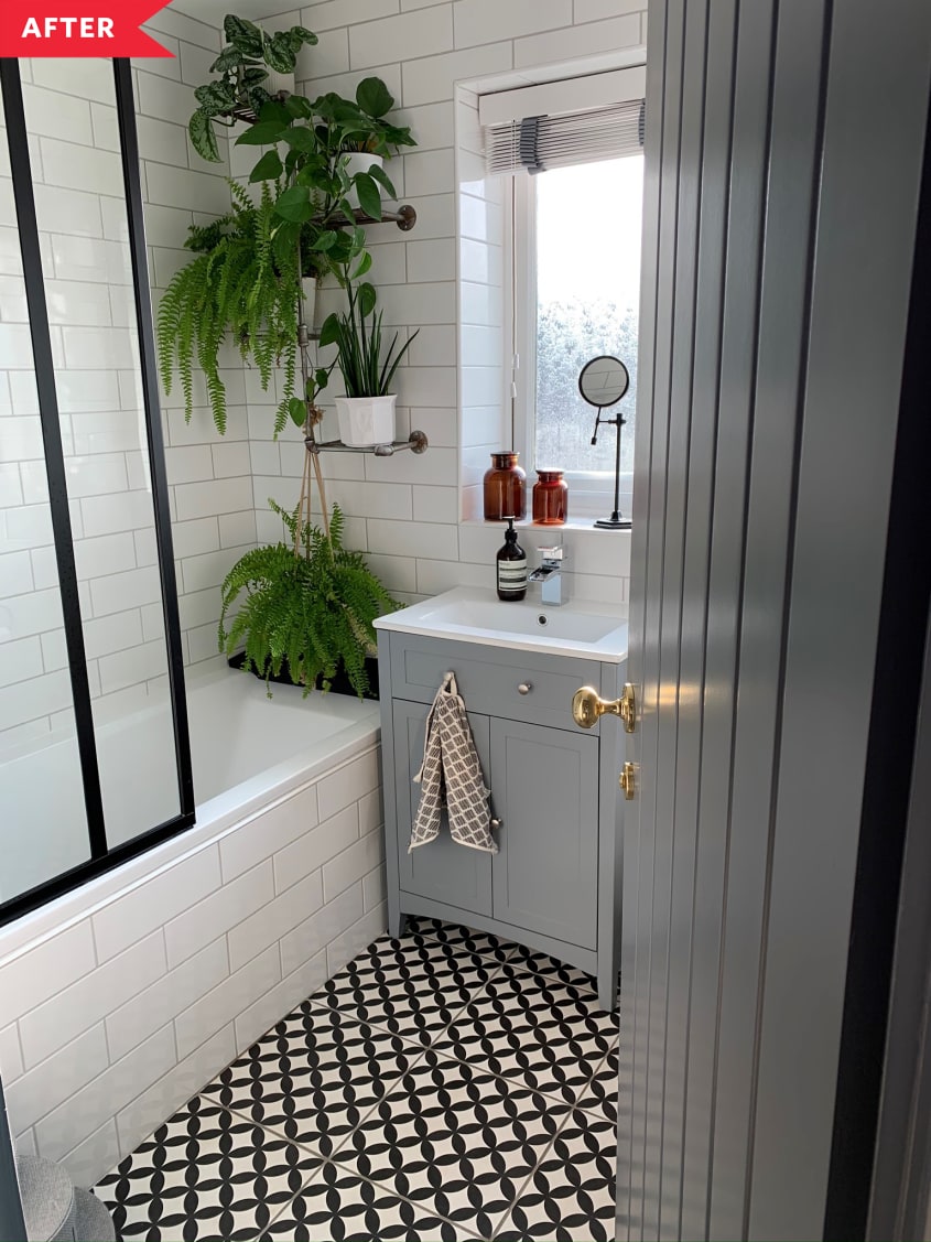 After: Bathroom with white and black floor and blue vanity