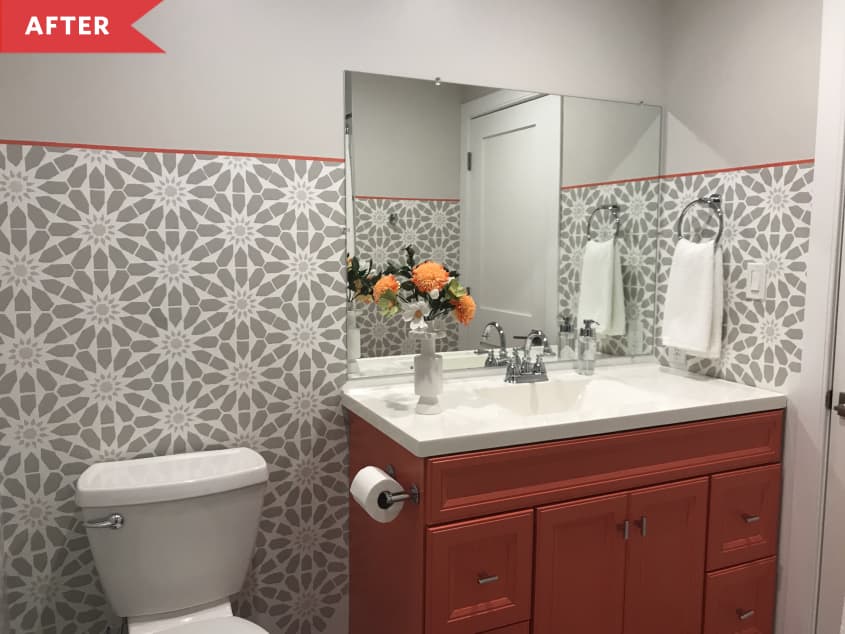 After: Coral vanity and gray-and-white stenciled walls