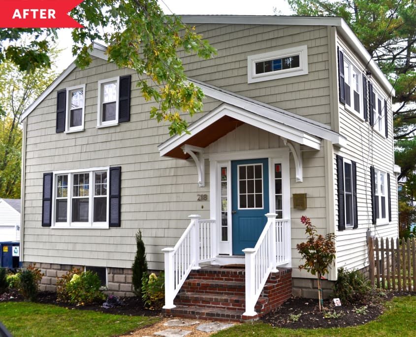 After: Cottage with wider siding, new shutters, and front door painted teal.