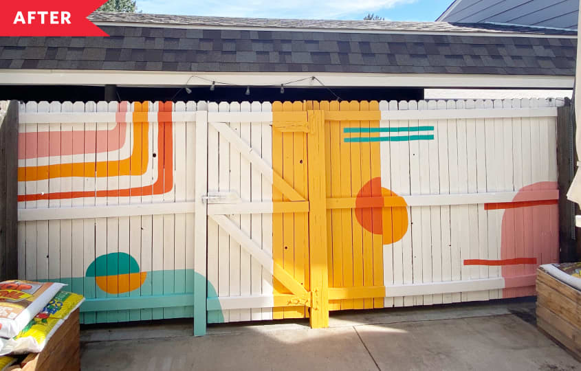 After: Fence painted with colorful geometric mural