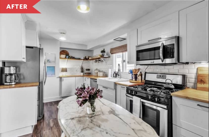 After: Bright kitchen with white cabinets and granite island