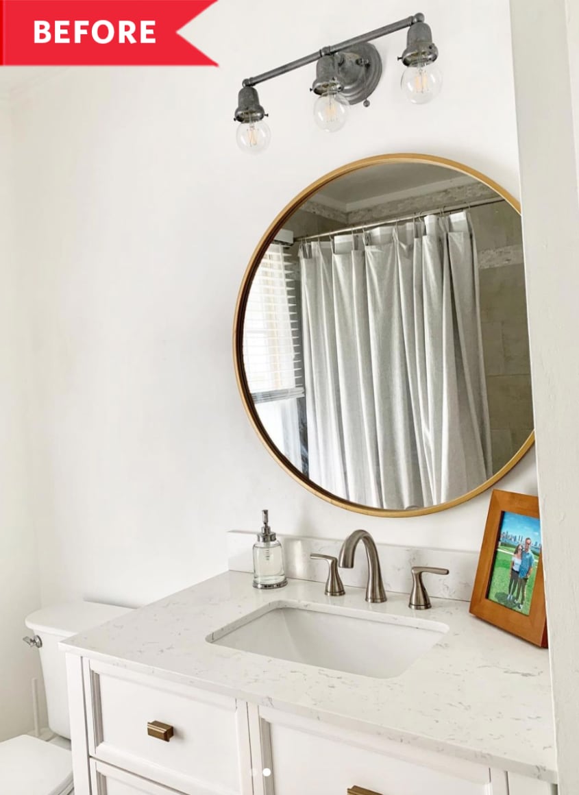 Before: Plain white bathroom with circular mirror