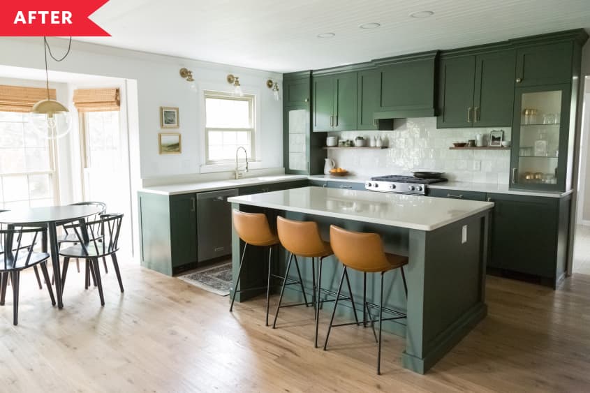 After: Kitchen with green-painted cabinets, white walls, and light wood floors