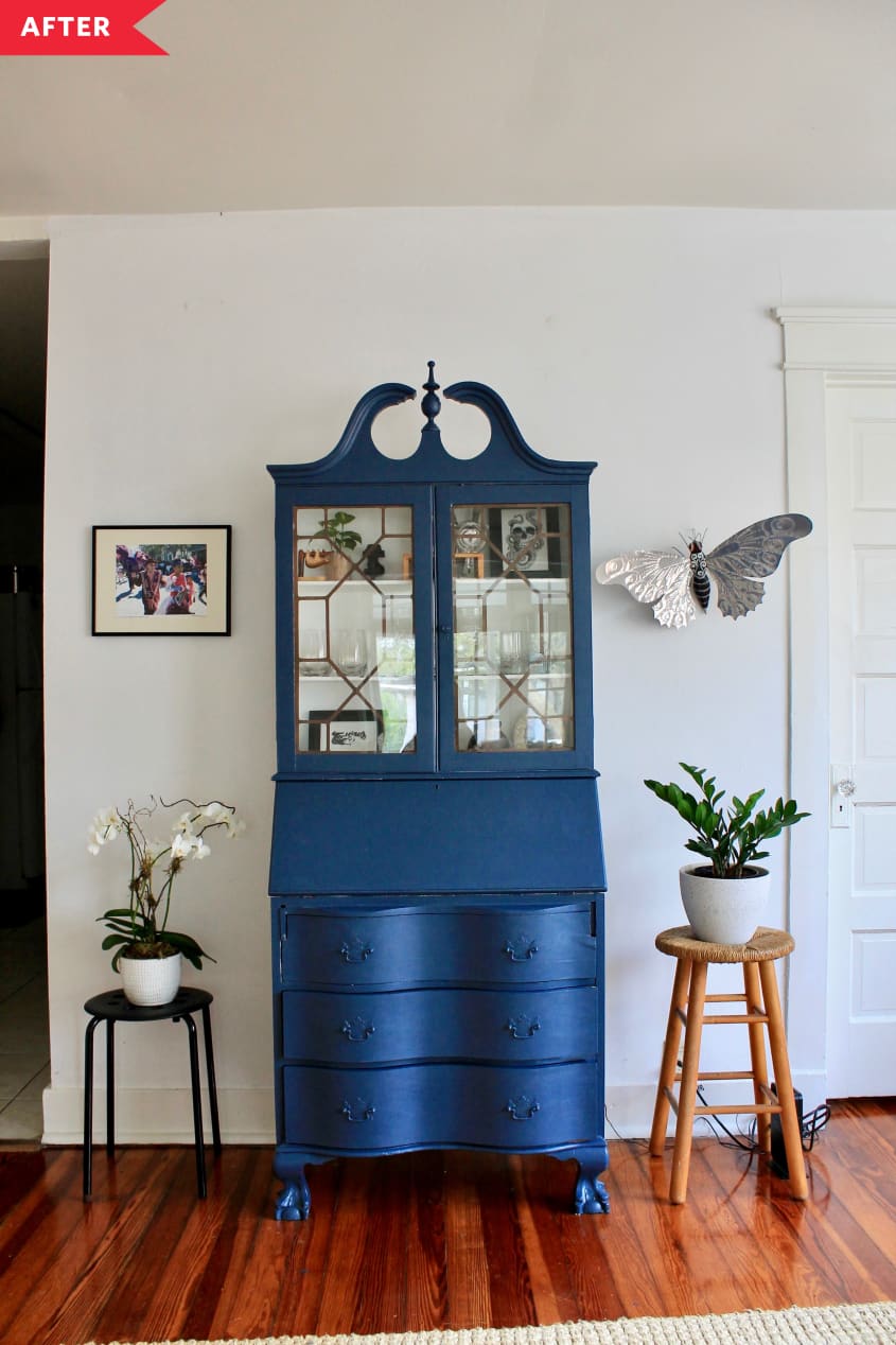 After: vintage cabinet painted navy blue, with glass doors and drawers closed
