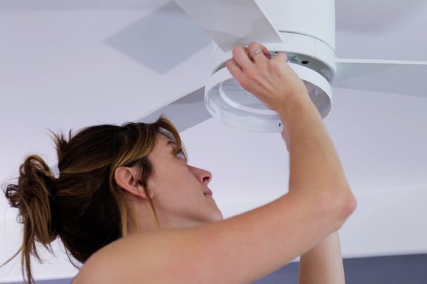 screwing light base into ceiling fan