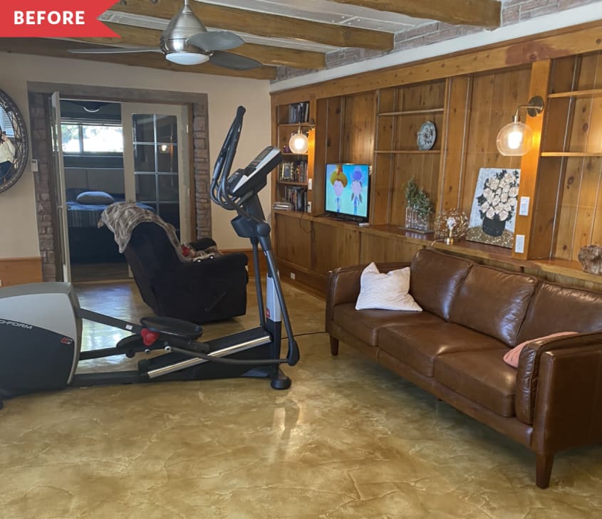 Before: Living room with wood-paneled shelving, exercise bike, and mustard-colored floors