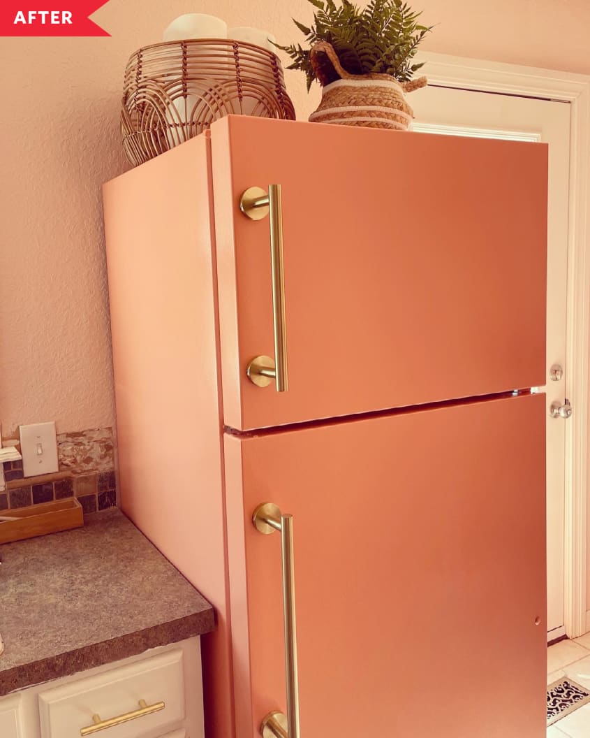 After: coral-painted fridge with gold pulls