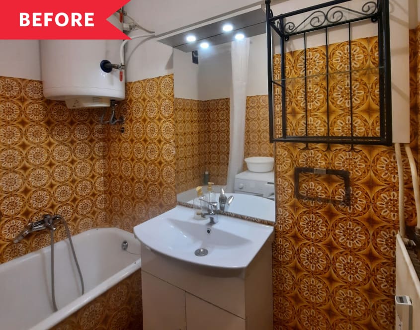 bathroom before renovation white walls white sink orange tile