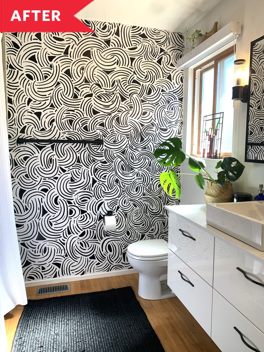 After: Bathroom with wavy black and white wallpaper