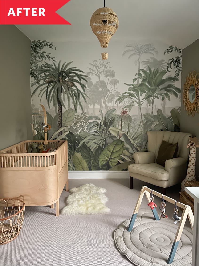 After: Tufted armchair next to bookshelf in nursery with tropical wall mural