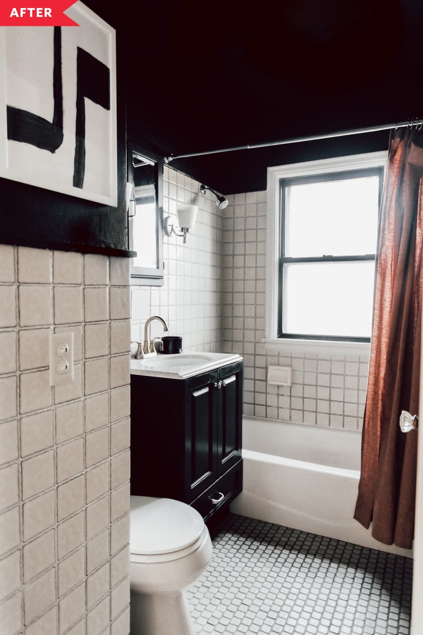 After: Bathroom with black vanity, black walls, black ceiling, white wall tile, and a clay-colored curtain
