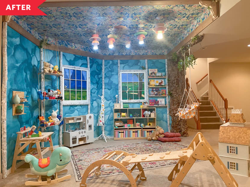After: Colorful play area with faux windows, wallpapered walls, and wallpapered ceiling