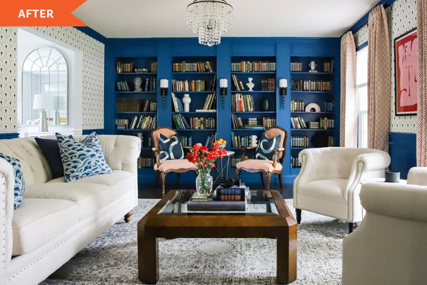 blue painted bookcase, white furniture, and brown coffee table