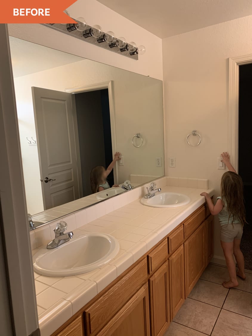 Before: Bathroom with orangey wood vanity and white walls. A young girl turns on the light switch.