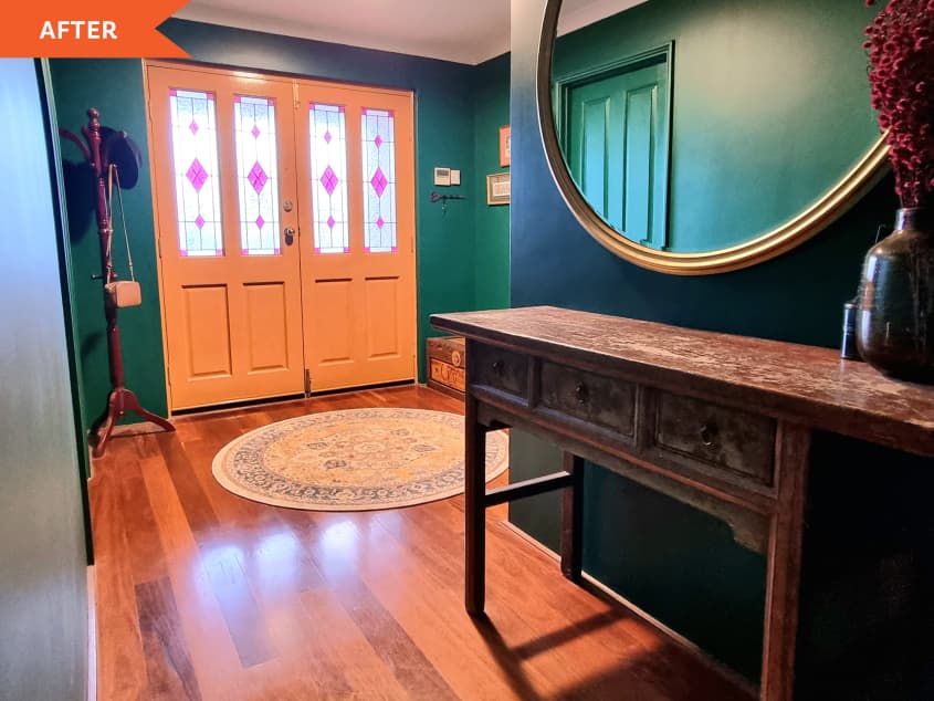 After: a emerald green entryway with stained glass windows in the yellow doors