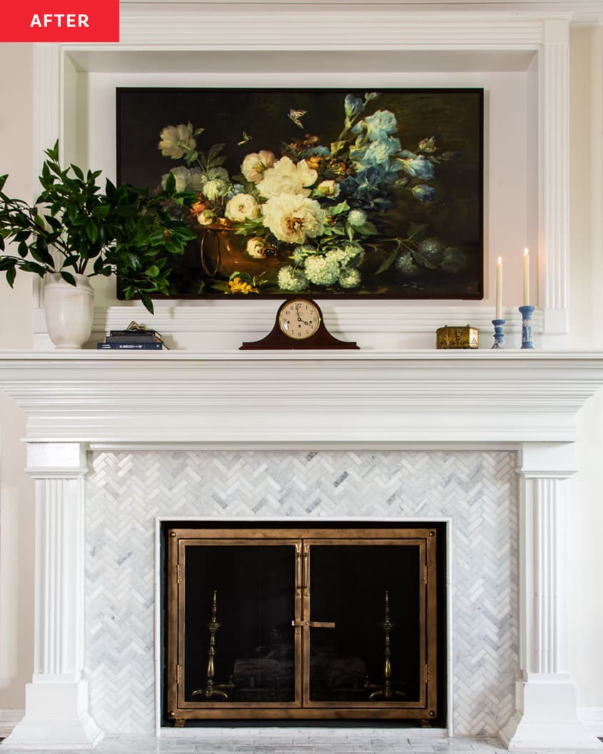 After: a white tiled fireplace with a floral print above the mantle