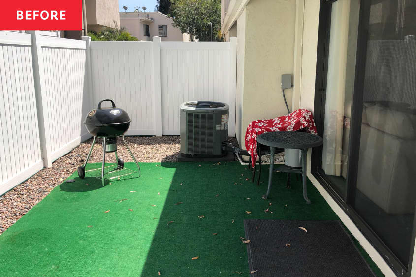 Patio area with green astro turf before renovation.