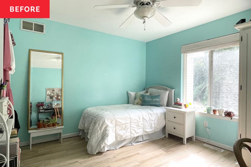 Aqua green painted bedroom with white furniture and gold rimmed floor length mirror in bedroom before renovation.