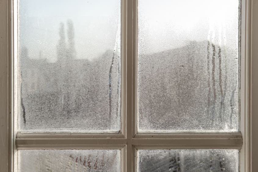 Close-up of misty window with condensation
