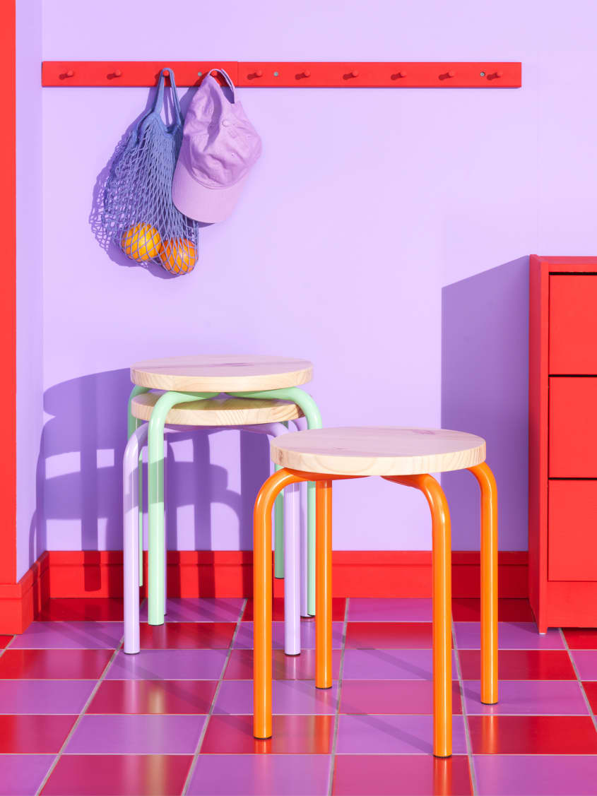 Colorful studio photo of items from the IKEA 80th anniversary Nytillverkad collection - stool with colorful legs