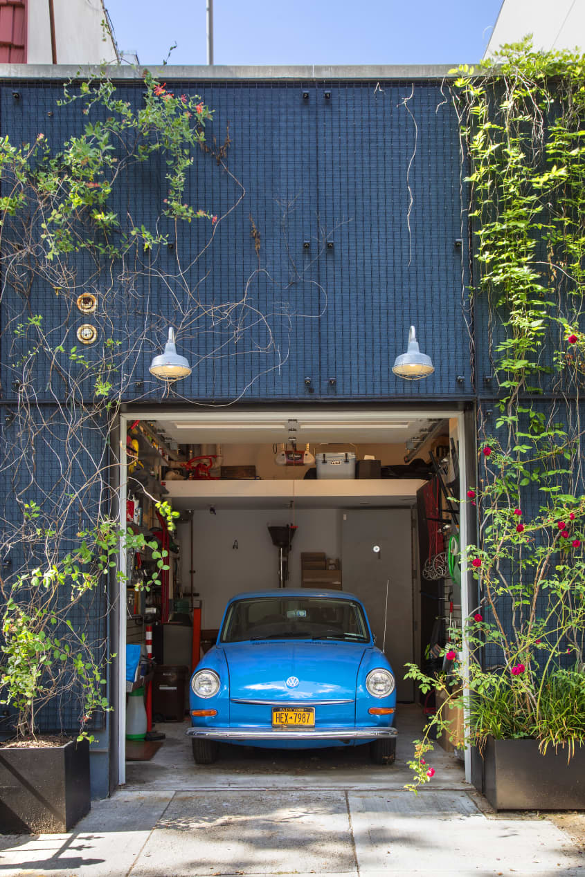 Garage with bright blue Volkswagen inside