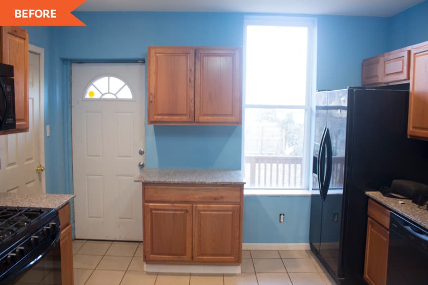 Kitchen before with tan cabinets and blue wall