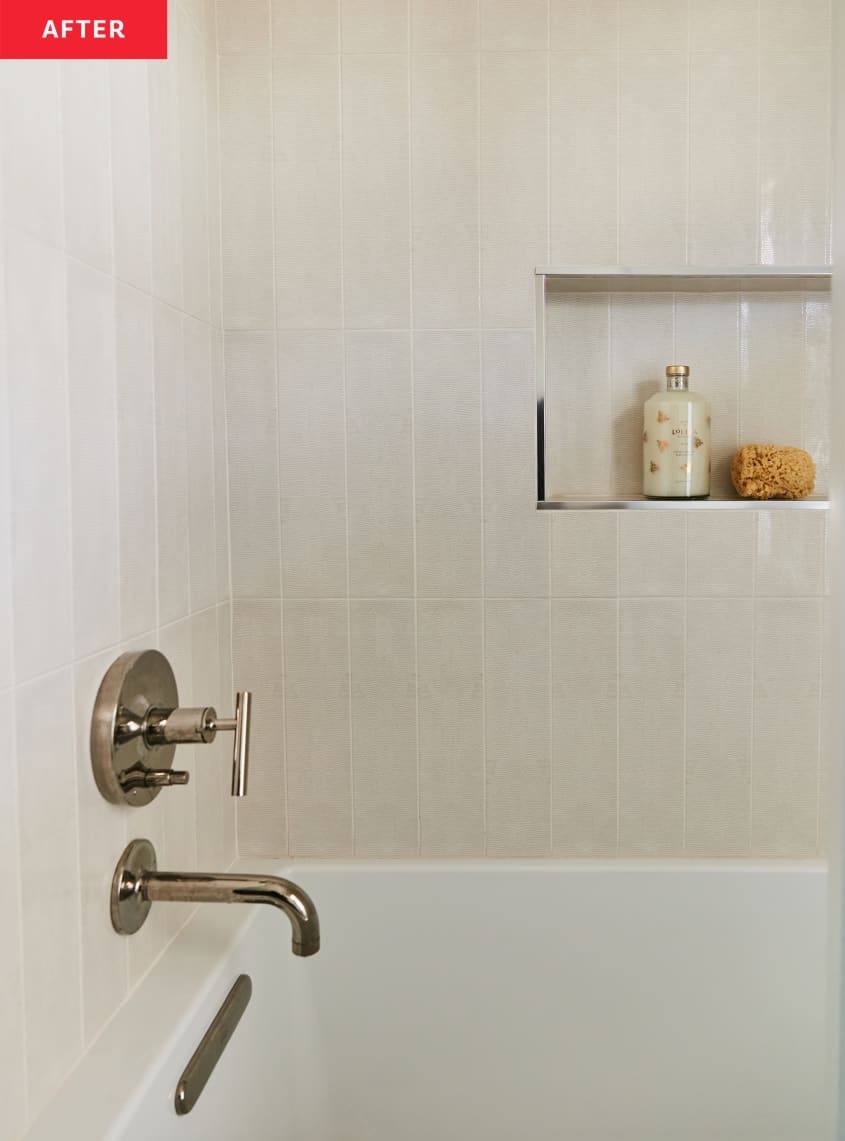 Bathroom after renovation/makeover: detail of shower/bath with pale neutral tiles
