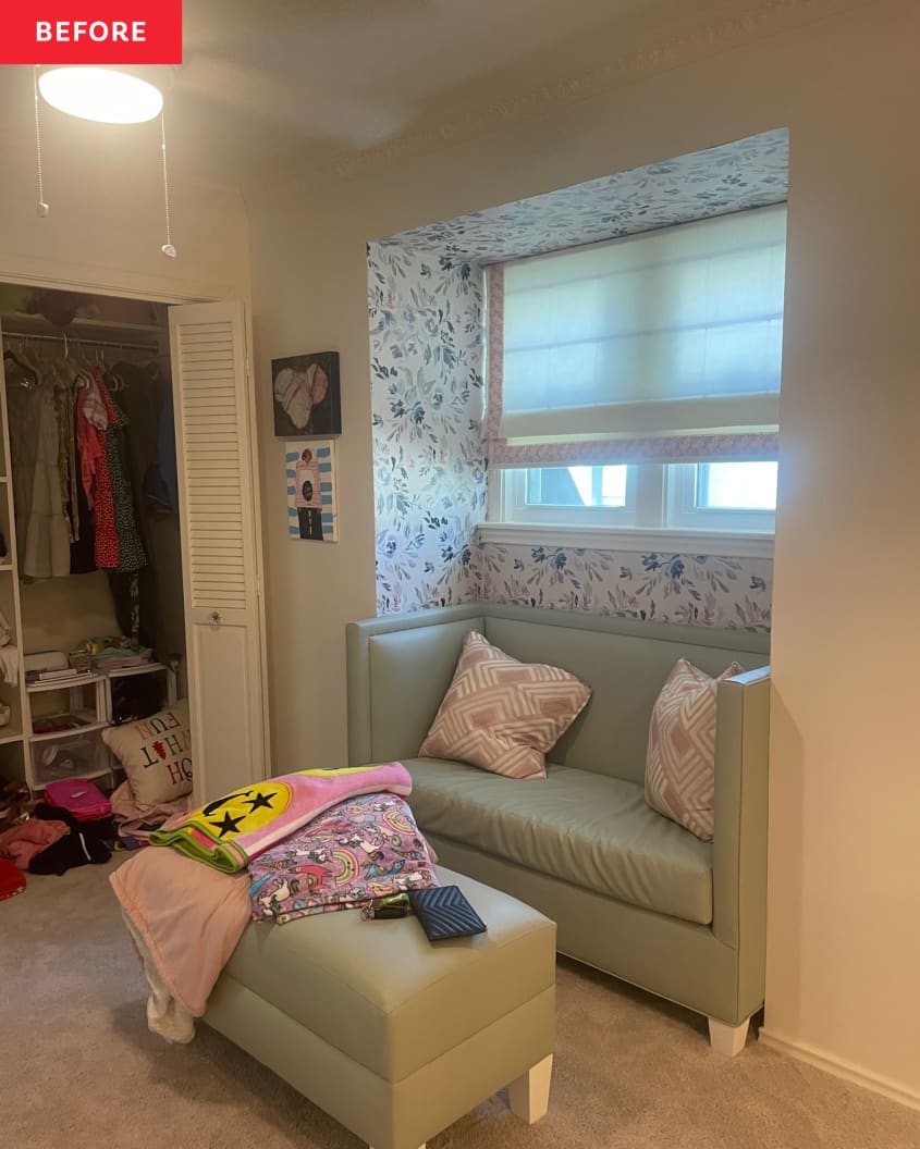 Green sofa underneath window in a teens bedroom.