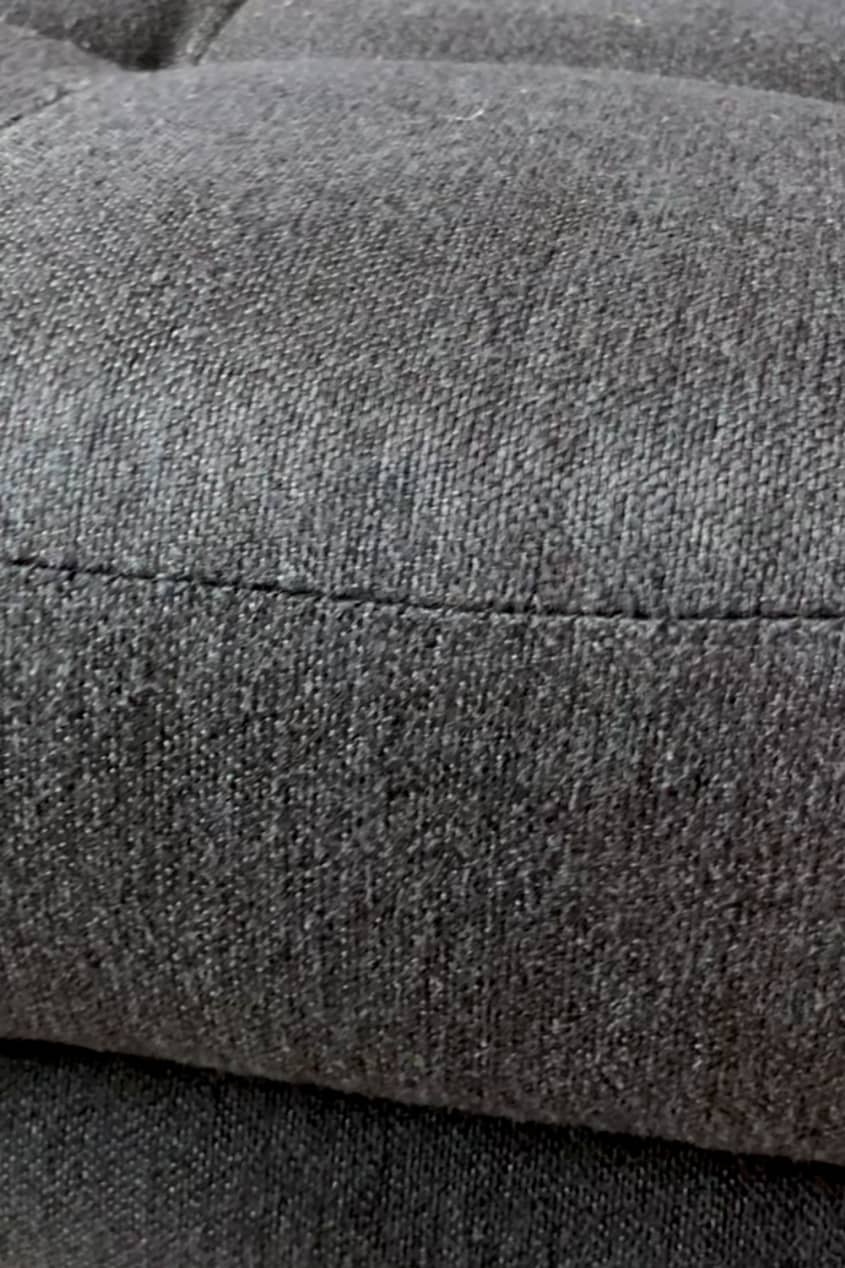 cushion on couch with clean fabric