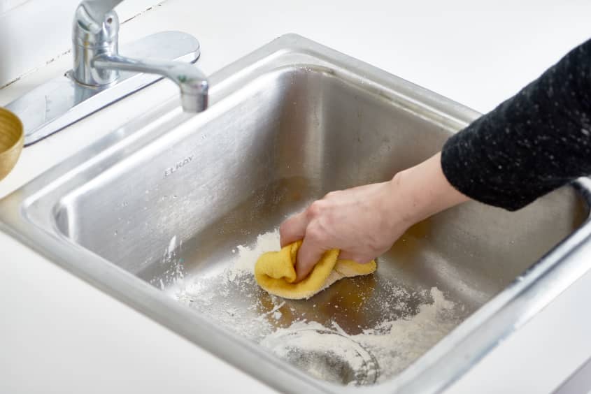 how-to-polish-a-stainless-steel-sink-with-flour-the-kitchn