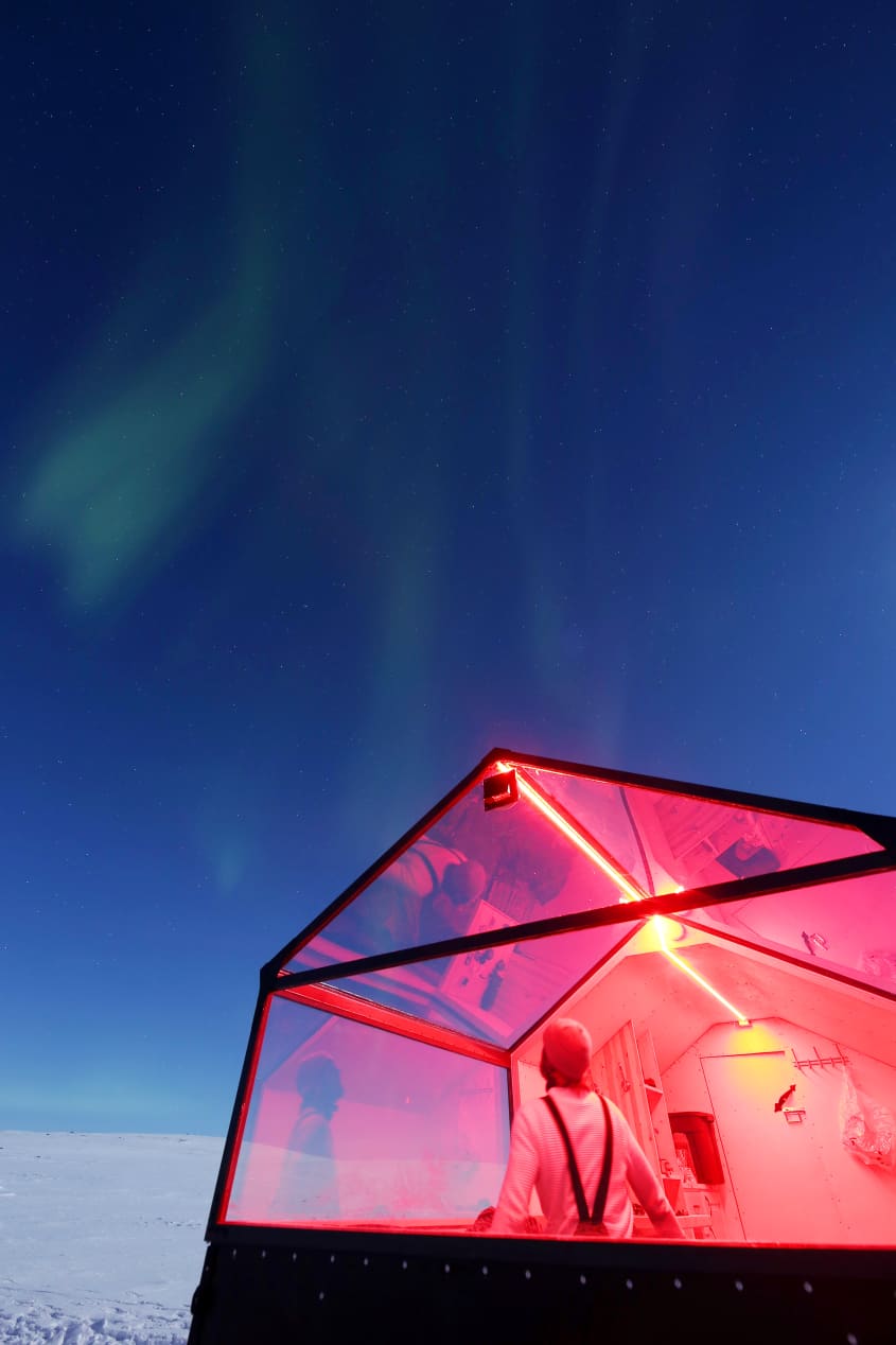 A New Glass Sled Hotel Offers Views of the Northern Lights Apartment