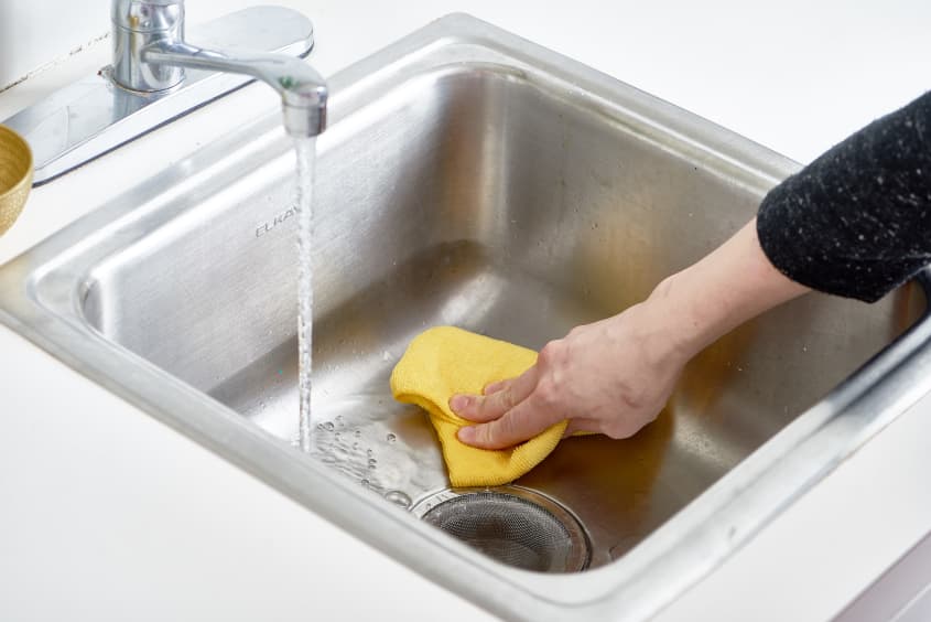 how-to-polish-a-stainless-steel-sink-with-flour-kitchn