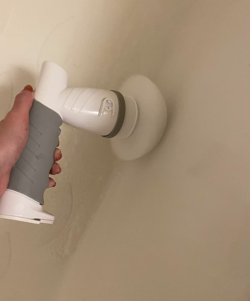 white and gray spin brush cleaning tub