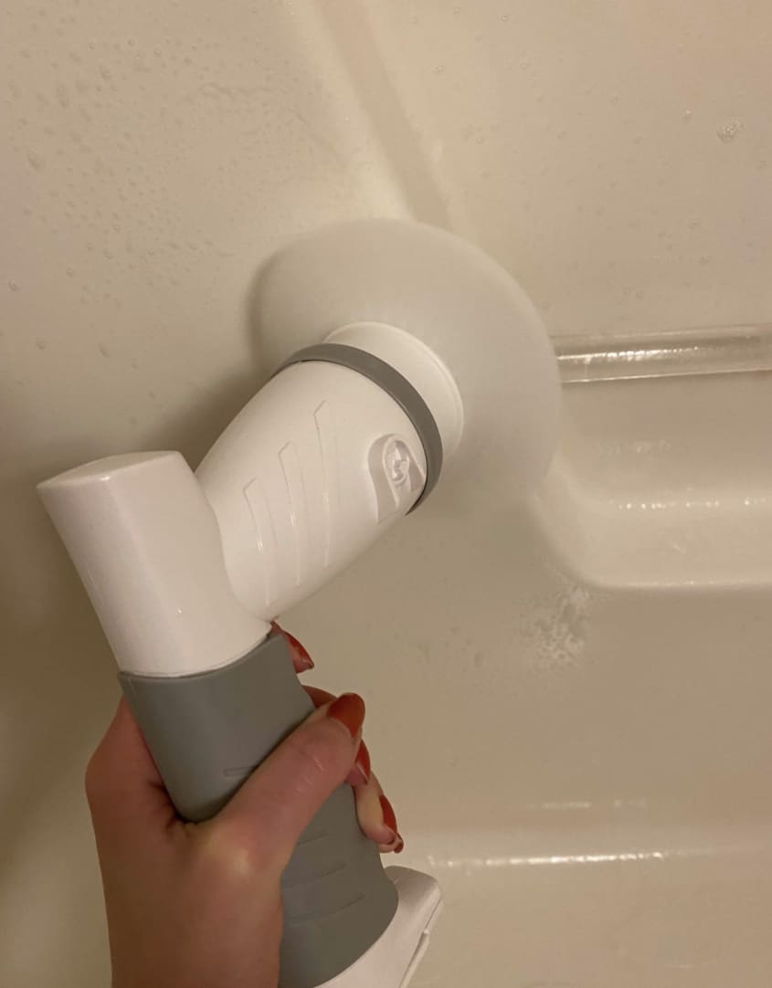 white and gray scrub brush cleaning tub