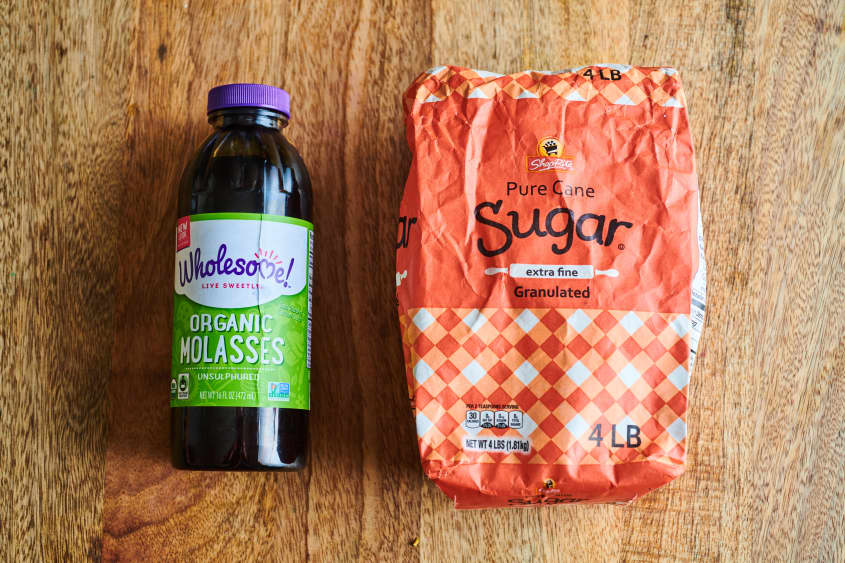 Bag of sugar and jar of molasses