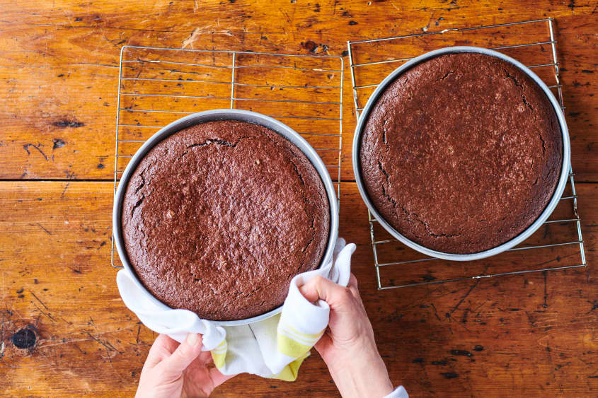 2 baked cake layers in their tins