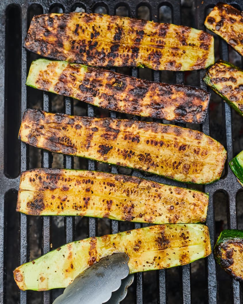 Turning zucchini on the grill