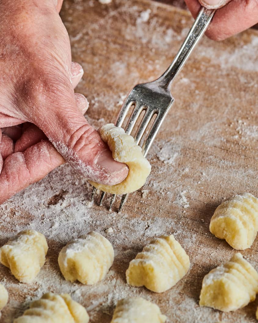 Gnocchi dough rolled on back of fork.